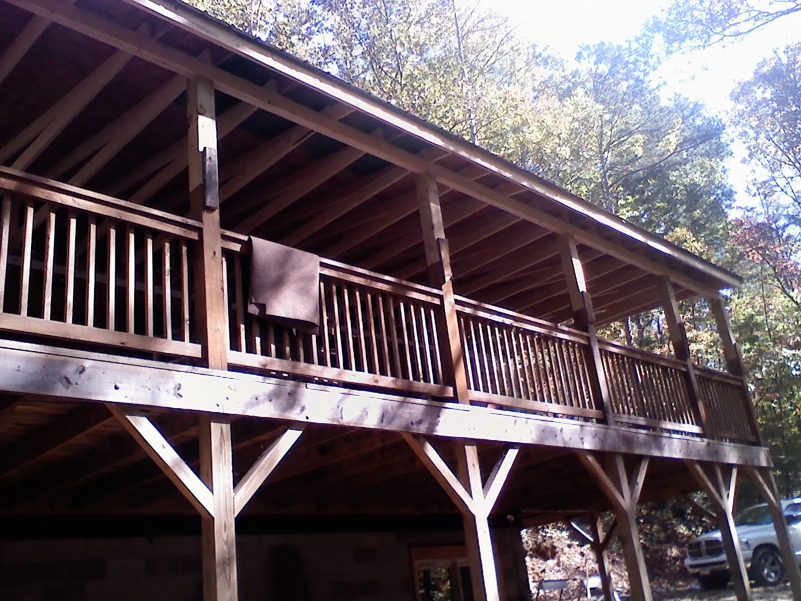 Timber framing under a new elevated porch and deck — Roof Leak Repair in Florissant by Roofing Brothers